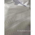 Tissu polyester blanc gaufré